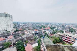 Well Furnished with Cozy Designed Studio Urbantown Serpong Apartment By Travelio