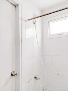 Simply Good Studio No Kitchen Apartment at Aeropolis Residence By Travelio