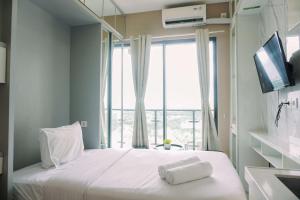 Best Deal and Strategic Studio Sky House BSD Apartment By Travelio