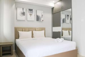 Spacious and Homey Studio at Daan Mogot City Apartment By Travelio