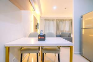 Great Deal Studio at Daan Mogot City Apartment By Travelio