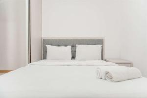 Homey and Modern Design 2BR Apartment at M-Town Residence By Travelio