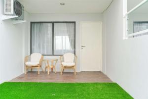 Good Deal Studio Loft Mezzanine (No Kitchen) at Kubikahomy Apartment By Travelio