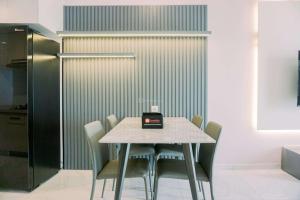 Homey and Spacious 3BR at Sky House BSD Apartment By Travelio