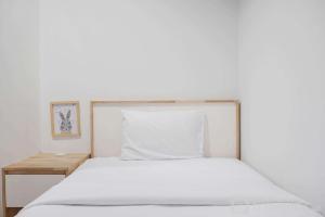 Premium and Comfortable 2BR Apartment at Royal Olive Residence By Travelio