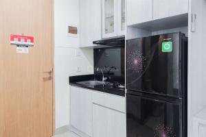 Homey and Restful Studio Apartment B Residence By Travelio