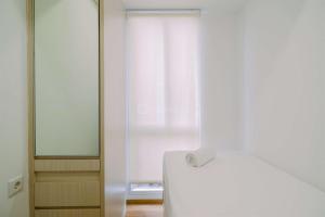 Warm and Well Designed 2BR Tokyo Riverside PIK 2 Apartment By Travelio