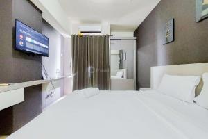 Good Deal and Comfort Stay Studio Serpong Greenview Apartment By Travelio