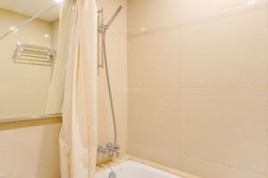 Nice and Warm 2BR Apartment Casa Grande Residence By Travelio