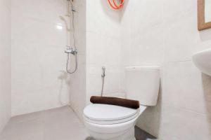 Good and Homey 2BR at Parkland Avenue Apartment By Travelio