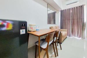 Good and Homey 2BR at Parkland Avenue Apartment By Travelio