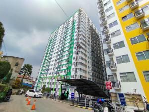 Cozy Style Studio Room at Jarrdin Cihampelas Apartment By Travelio