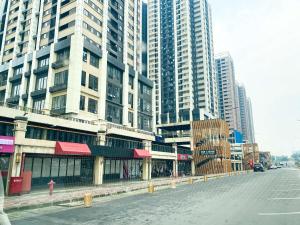 Spacious and Homey 2BR with Extra Room at Meikarta Apartment By Travelio