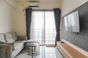 Serene and Modern 2BR Sky House BSD Apartment near AEON By Travelio