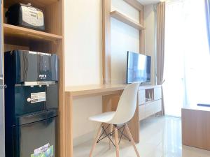 Best Deal and Restful 1BR Vasanta Innopark Apartment By Travelio