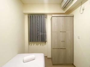 Homey and Enjoy 2BR Apartment Meikarta By Travelio