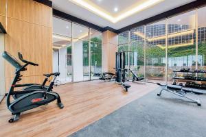 Warm and Minimalist Studio Transpark Bintaro Apartment By Travelio