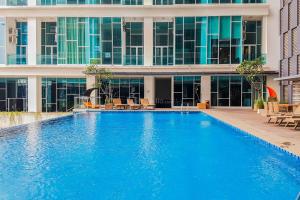 Compact and Homey Studio at Brooklyn Alam Sutera Apartment By Travelio