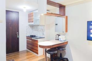 Good Choice and Homey Studio at Serpong Greenview Apartment By Travelio