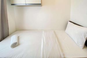 Homey Living 2BR at Tokyo Riverside PIK 2 Apartment By Travelio