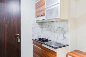 Good Choice and Homey Studio at Serpong Greenview Apartment By Travelio