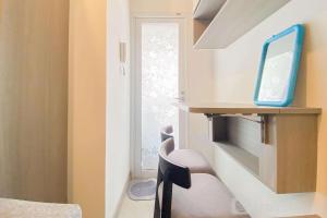 Homey Living 2BR at Tokyo Riverside PIK 2 Apartment By Travelio