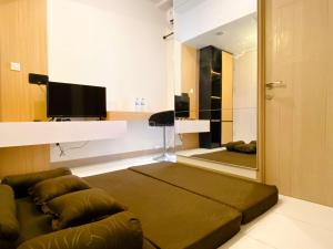 Good Deal and Restful 2BR Apartment Tokyo Riverside PIK 2 By Travelio