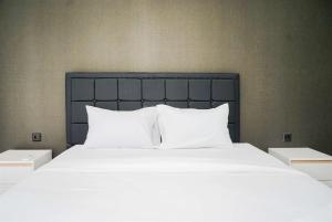 Nice and Restful 1BR Apartment Carstensz Residence By Travelio