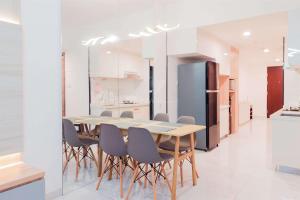 Comfy 3BR Sky House BSD Apartment By Travelio