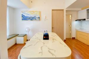 Combined and Comfort Stay 2BR Tokyo Riverside PIK 2 Apartment By Travelio