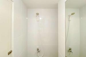 Modern Furnished and Homey Studio Tokyo Riverside PIK 2 Apartment By Travelio