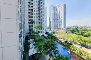 Comfy and Warm Studio Serpong Greenview Apartment By Travelio