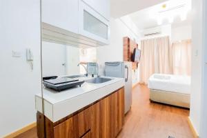 Good Choice and Restful Studio Apartment M-Town Residence near Mall By Travelio
