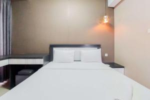 Best Price and Homey 2BR at Transpark Bintaro Apartment By Travelio
