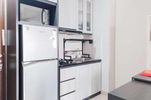 Best Price and Homey 2BR at Transpark Bintaro Apartment By Travelio