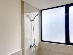 Modern Look 2BR Meikarta Apartment By Travelio