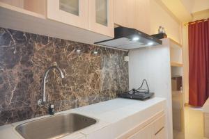 Minimalist and Comfy Studio at Tokyo Riverside PIK 2 Apartment By Travelio