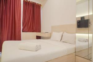 Minimalist and Comfy Studio at Tokyo Riverside PIK 2 Apartment By Travelio