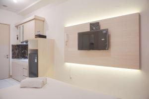 Minimalist and Comfy Studio at Tokyo Riverside PIK 2 Apartment By Travelio