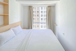 Cozy and Well Designed 2BR Tokyo Riverside PIK 2 Apartment By Travelio