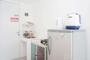 New and Simply Studio at Urbantown Serpong Apartment By Travelio