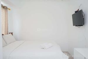 New and Simply Studio at Urbantown Serpong Apartment By Travelio