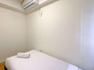 Comfort 2BR with Work Space at Meikarta Apartment By Travelio