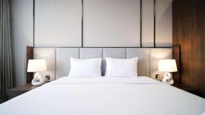 Tidy and Spacious 2BR at Grand Sungkono Lagoon Apartment By Travelio