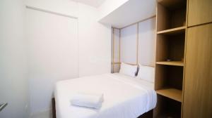 Comfy and Spacey 2BR Apartment at Suncity Residence By Travelio