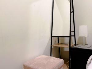 Clean and Homey 2BR at Meikarta Apartment By Travelio