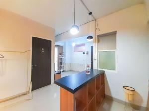 Homey and Warm 1BR at Student Castle Yogyakarta Apartment By Travelio