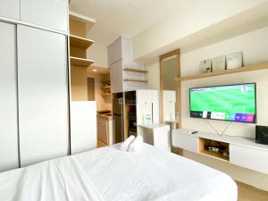 Best Homey and Nice Studio at Vasanta Innopark Apartment By Travelio