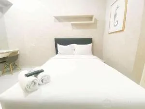Elegant and Homey Studio at Amartha View Apartment By Travelio - 沃诺索博
