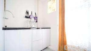 Homey Studio Apartment at Dian Regency By Travelio